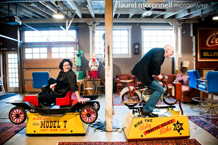 silly couple racing small vintage kid cars