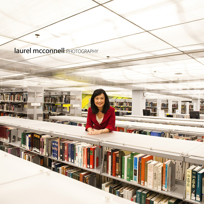 Broadcast journalist Josephine Cheng poses in the Seattle Libary for an environmental portrait
