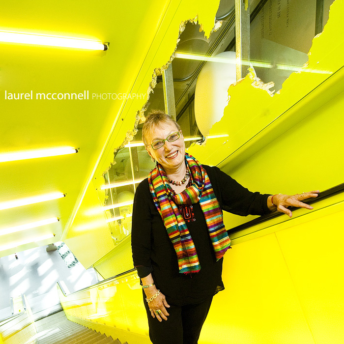 Sweet artist Joan Stuart Ross's portrait on the escalator at the Seattle Central LIbrary