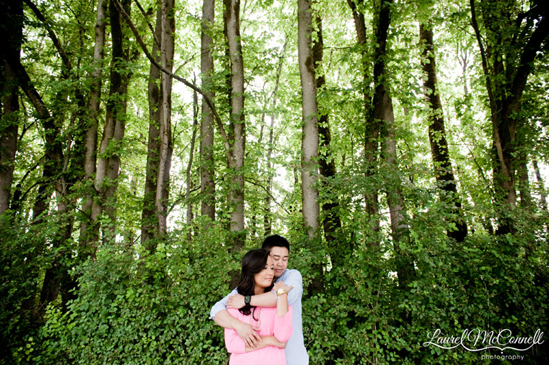 Engagement photo of couple in woods in Woodinville, WA winery.