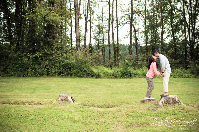Couple kissing at Woodinville winery for pre wedding photography.